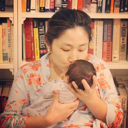 MJ Lee with her newly born baby, Penelope Lee Burns
